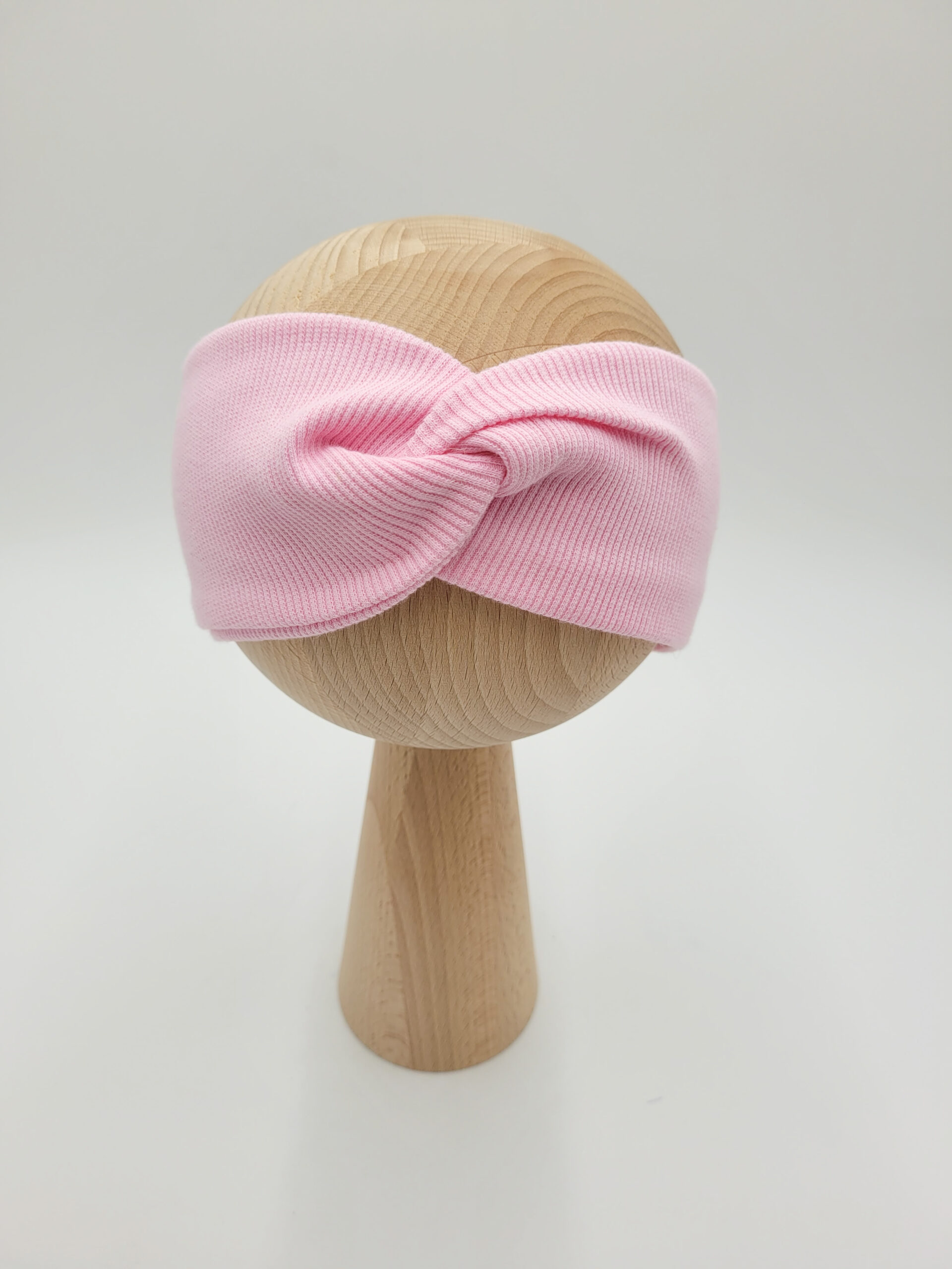 Opaska przeplatana różowa.