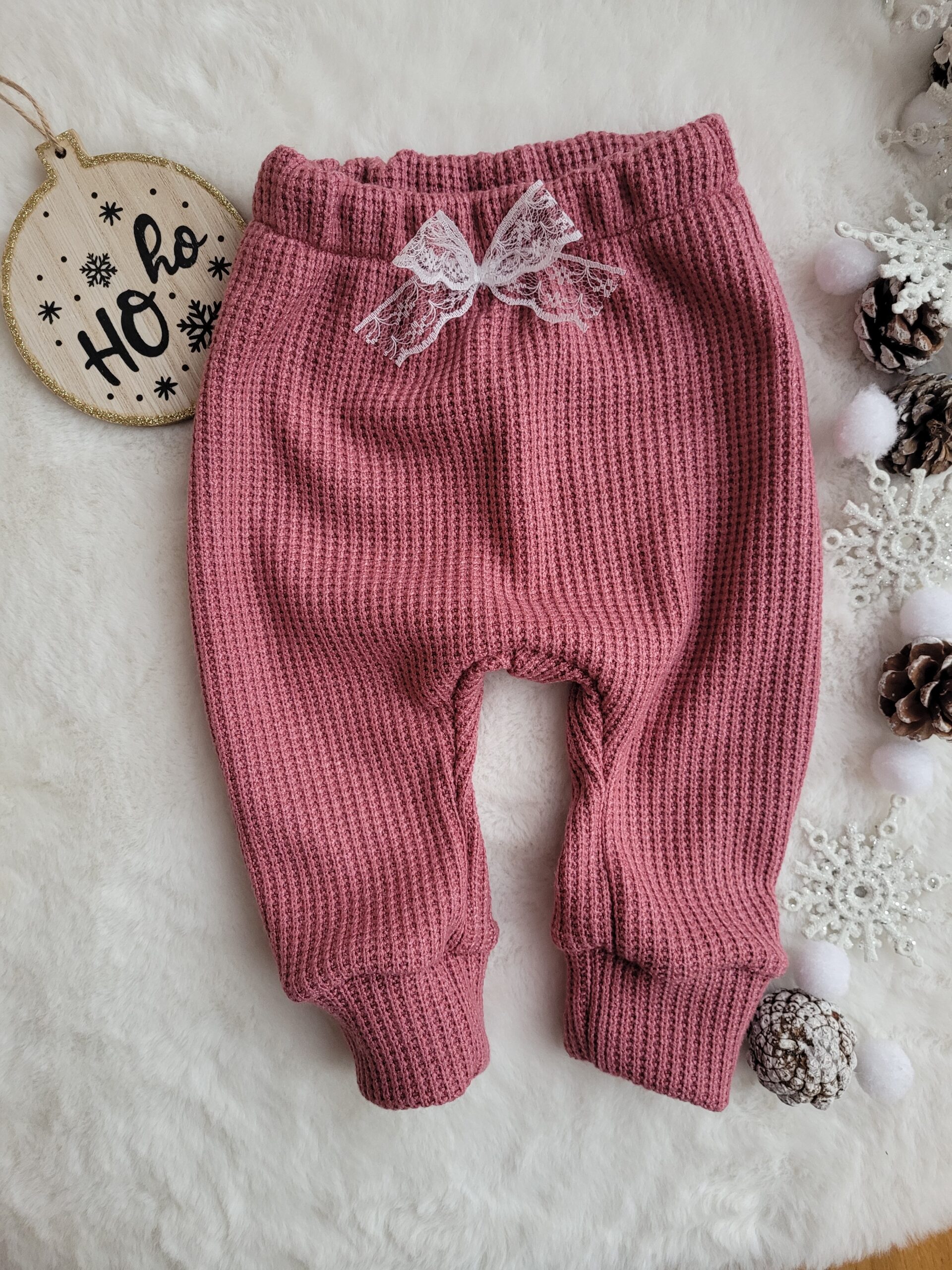 Spodnie dziecięce z kokardką róż wrzosowy