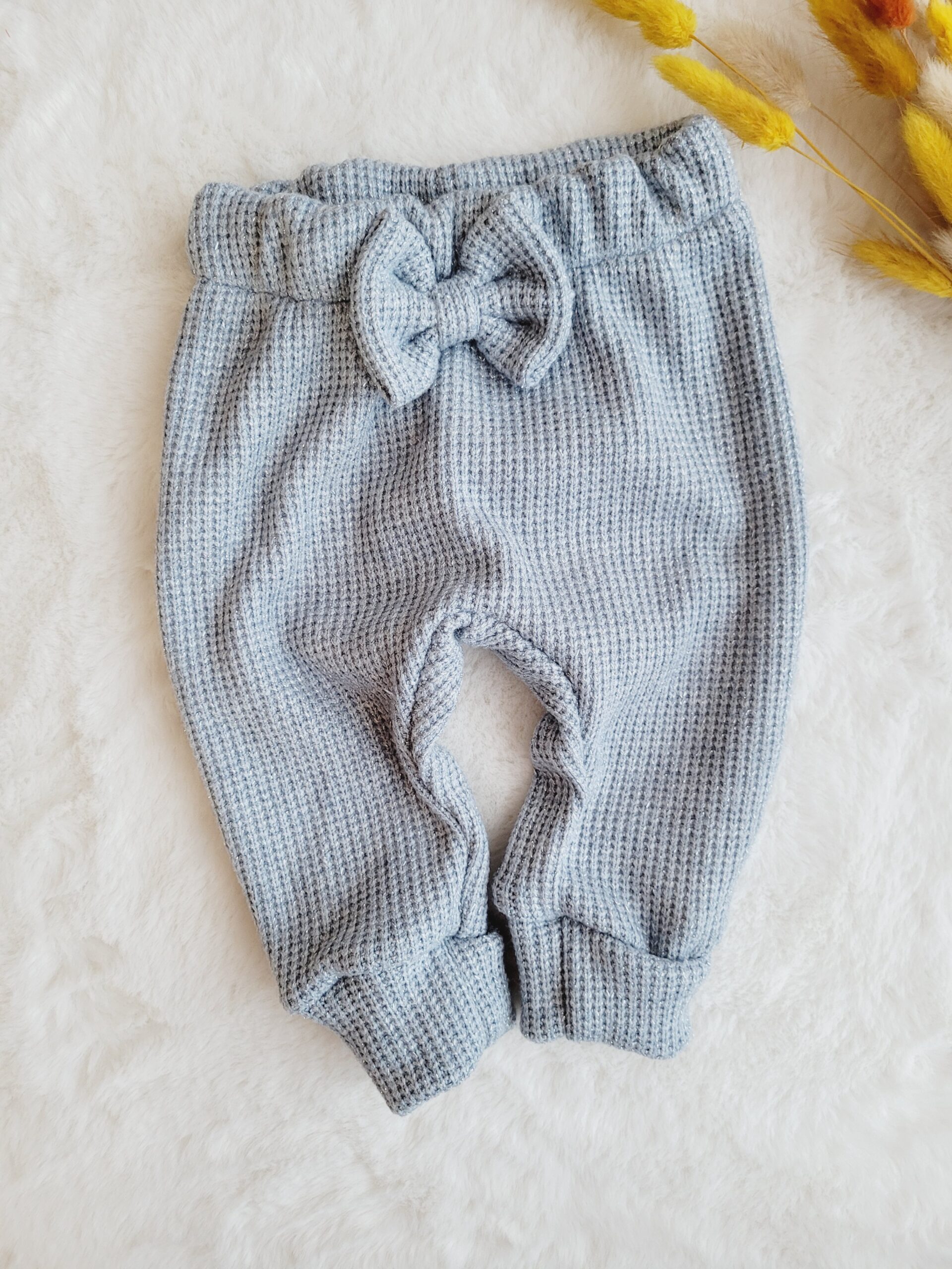 Spodnie dziecięce z kokardką błękit