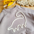 Bluza-z-aplikacja-dinozaur-scaled-1.jpg