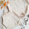 Bluzy-z-napisem-over-jasny-bez-scaled-1.jpg