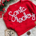 Sweterek świąteczny dla dziecka z haftem Santa Baby - kolory